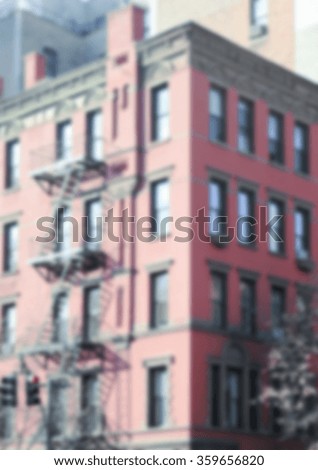 Windows, building facade background with an intentional blur effect applied.