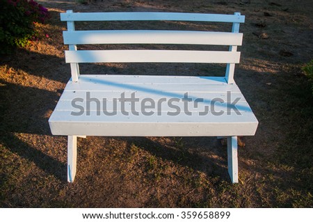 Empty white bench  in sunny day