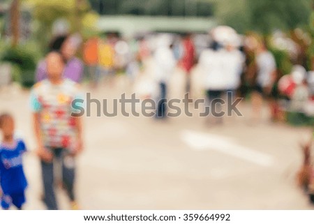 Blurred background of people in the garden summer