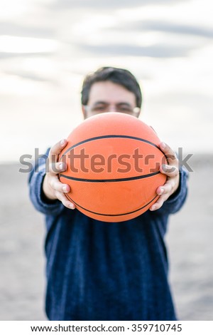 man holding a ball