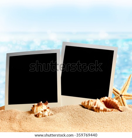 photo frames on the sea sand on the beach background