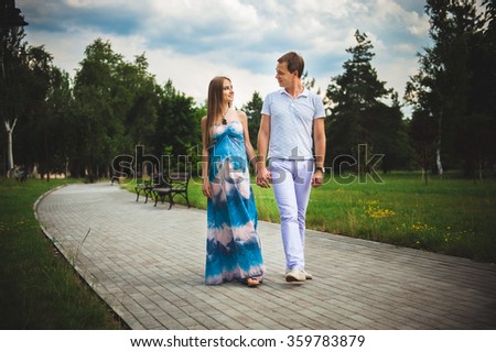 Pregnant Couple on the park