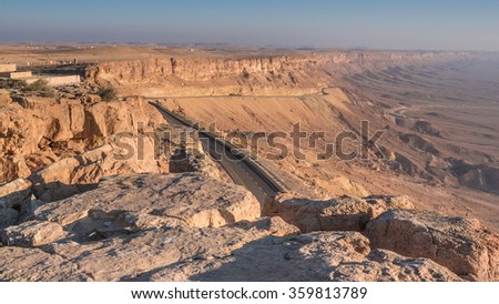 Ramon Crater (Makhtesh Ramon), the world's largest, as seen from the northern rim, as taken from the top of the cliff shortly after sunrise, Ramon Nature reserve, Mitzpe Ramon, Negev desert,Israel Royalty-Free Stock Photo #359813789