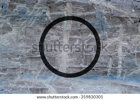 Black flat circle on abstract stone background. Abstract psychedelic background. 