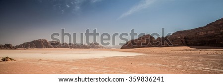 Jordanian desert of Wadi Rum in Jordan. Wadi Rum is known as the Valley of the Moon and the UNESCO World Heritage List. Royalty-Free Stock Photo #359836241