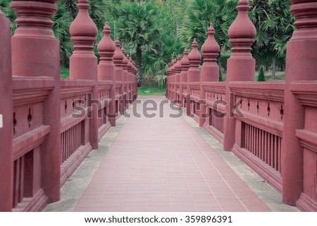 Beautiful lanna bridge and green background.