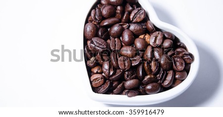 heart from coffee beans, isolated on white