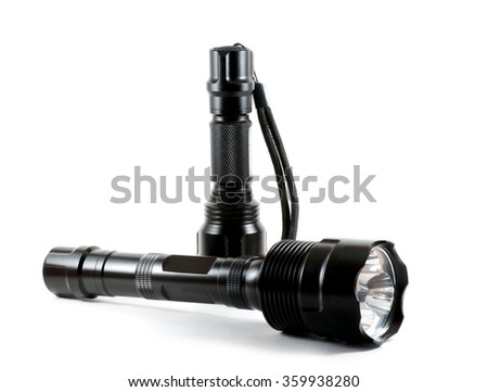 Two isolated black flashlights with cord over white
