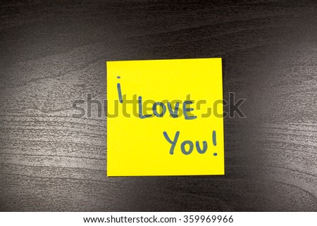 I Love You sticky note on black background