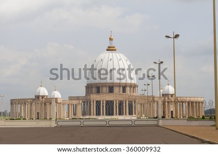 YAMOUSSOUKRO, IVORY COAST, AFRICA. July 3, 2013. Catholic Basilica of Our Lady of Peace (Basilique Notre-Dame de la Paix) stock image. It is the largest "church" in the world (Guinness World Records) Royalty-Free Stock Photo #360009932