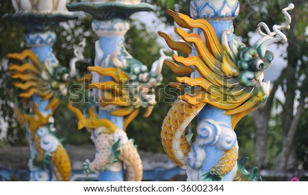 Pillar with Sculpture of a colorful Dragon, Island of the coconut monk, Vietnam