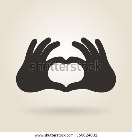 hand gesture a sign of heart on a light background