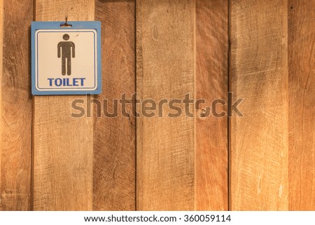 Banners hung on the walls, wooden bathroom