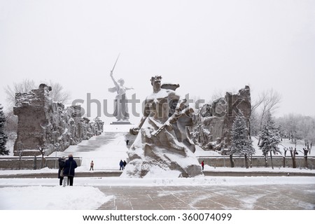 Memorial complex Mamayev Kurgan in the hero-town of Volgograd in winter time under snow Royalty-Free Stock Photo #360074099
