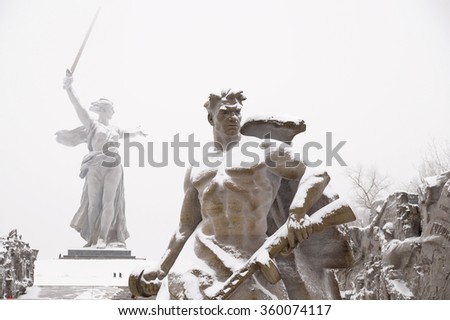 Monument fragment "To a step backwards" on Mamayev Kurgan in the city of Volgograd in winter time under snow Royalty-Free Stock Photo #360074117