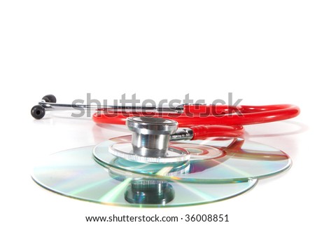 Stethoscope and a cd disk - checking the content of the disk. Could be used for medical and computer purposes!