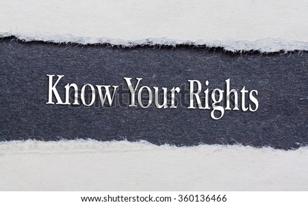 Rip Blue Paper and white background with know your rights written on