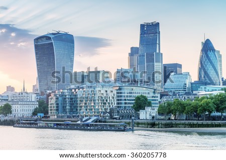 London. City buildings along river Thames.
