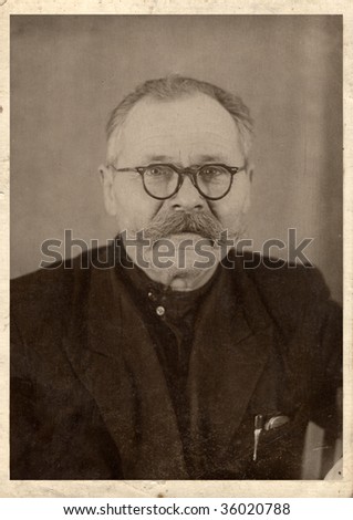 elderly man with glasses and big mustaches. old photo, USSR