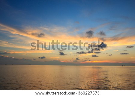 Offshore sunset cloudy skies and sea Industry oil and gas