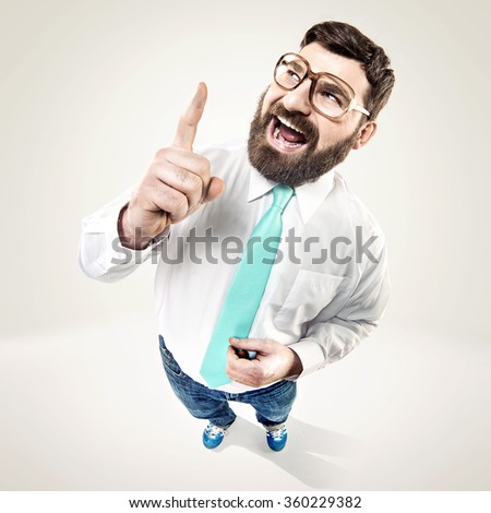 Excited nerdy guy raising his finger