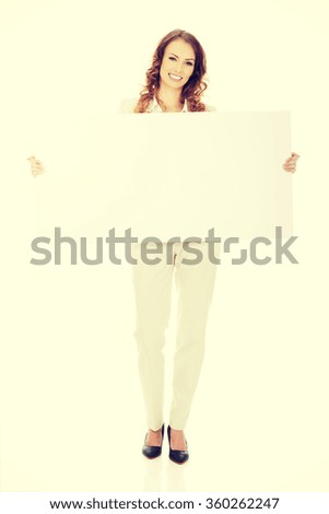 Business woman with empty banner.