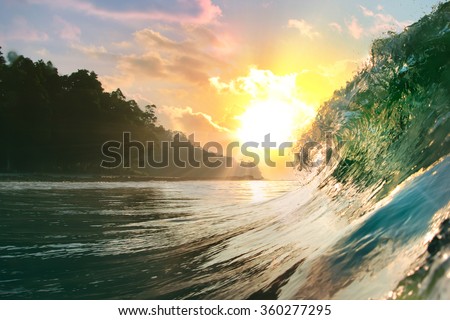 Tropical oceanic background. Beautiful colorful ocean wave closing near beach 