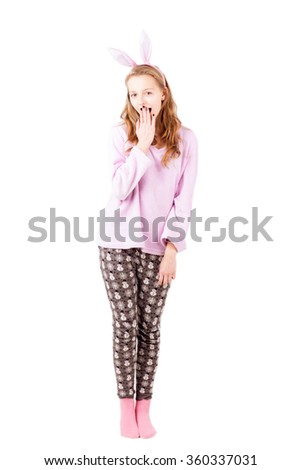 Woman in pajamas isolated on white