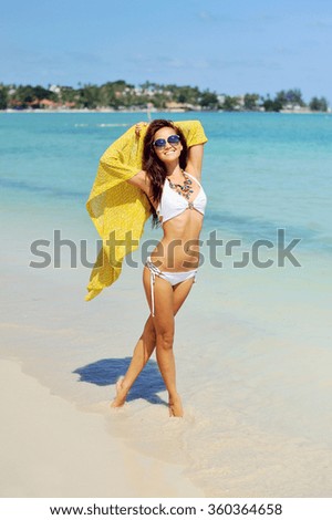 Attractive young woman on the beach