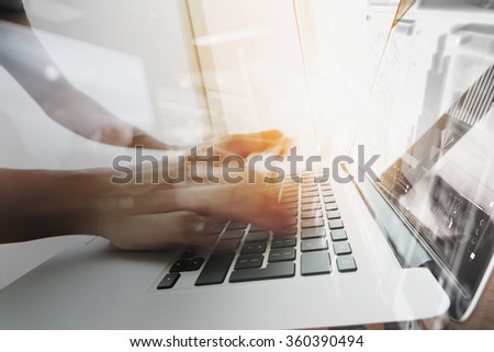 designer moving hands working with laptop computer and digital web design diagram as concept Royalty-Free Stock Photo #360390494