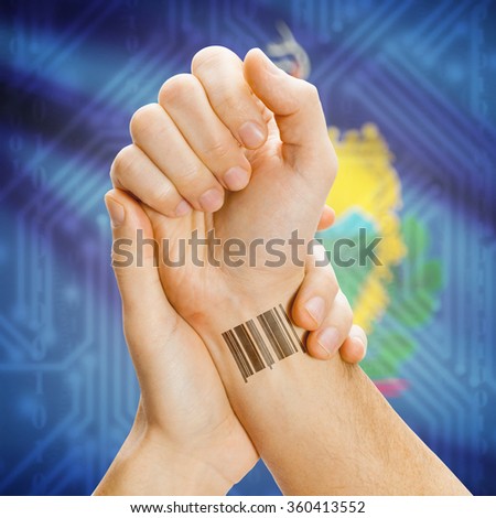 Barcode ID number tattoo on wrist and USA states flag on background series - Vermont