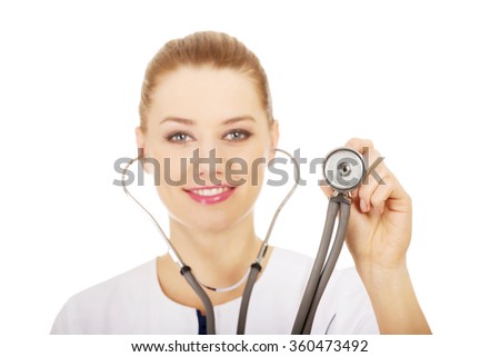 Medical doctor woman with stethoscope. 