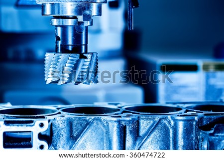 Metalworking CNC milling machine. Cutting metal modern processing technology. Royalty-Free Stock Photo #360474722