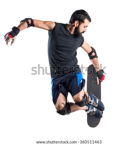 Man with skateboard jumping