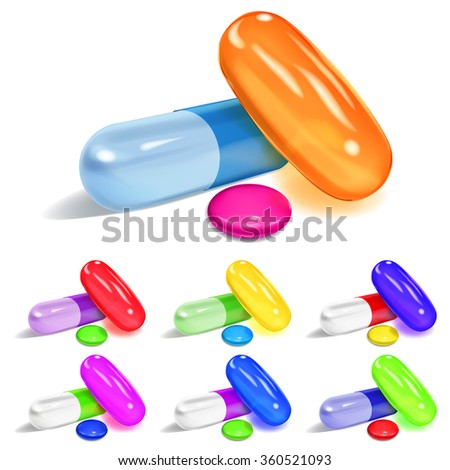 Set of oblong and elliptical multicolored capsules and round pills with shadows on white background