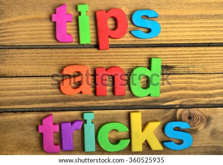 Tips and Tricks word on wooden table