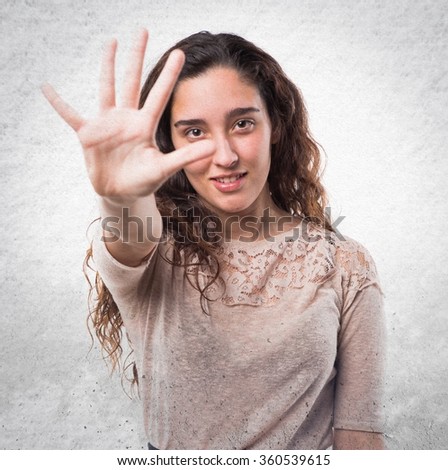 Teenager girl counting five