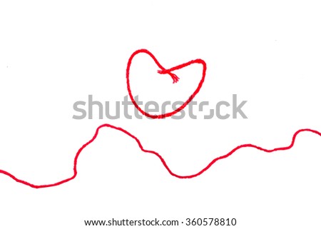 red thread wit heart sign isolated on white background