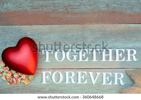 Vintage Tone Filter : Valentine word  TOGETHER FOREVER and Red Heart on Wood Background