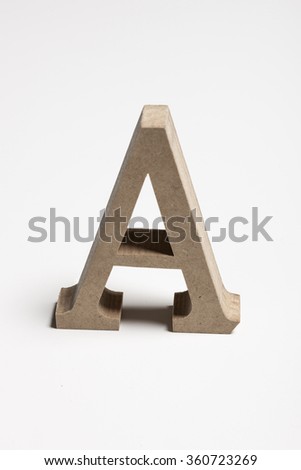 An alphabet 'A' made in wood(mdf) for interior and education white background at the studio. 