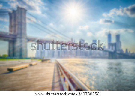 Defocused background of the Brooklyn Bridge in New York City. Intentionally blurred post production for bokeh effect