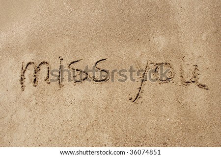 Miss you handwritten in sand for natural, symbol,tourism or conceptual designs