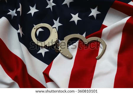 Handcuffs and American Flag