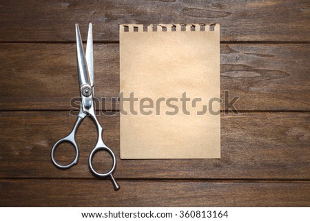 Vintage Still-Life With Paper And Scissors On Wooden Table 