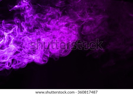 Pink with purple color of smoke on dark background