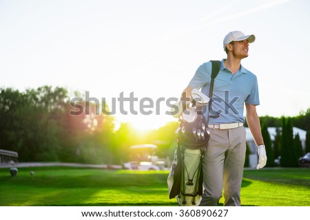 Young man with a stick outdoors Royalty-Free Stock Photo #360890627