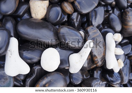 coral rock imaging word love on black river rocks background