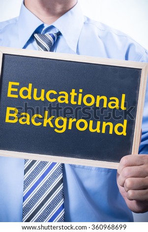 Businessman holding a Blank chalkboard with text Educational background