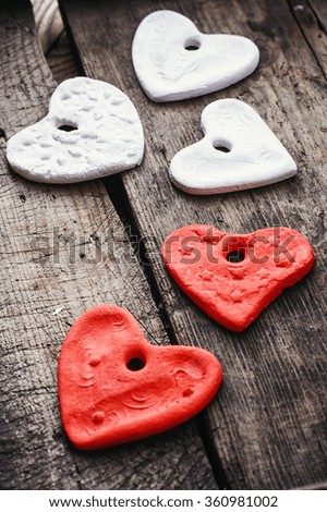 Set of symbolic hearts.Sculpted hearts made from salt dough handmade.Selective focus