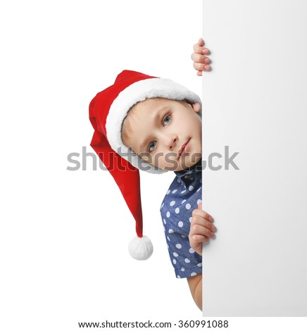 Boy in Santa hat isolated on white background, close up